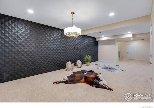 unfurnished dining area featuring carpet floors