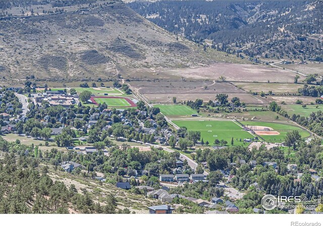 bird's eye view with a mountain view