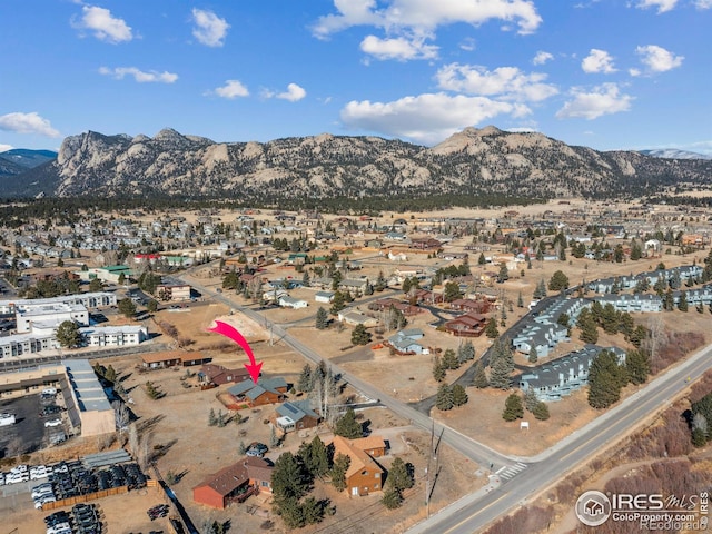 bird's eye view with a mountain view