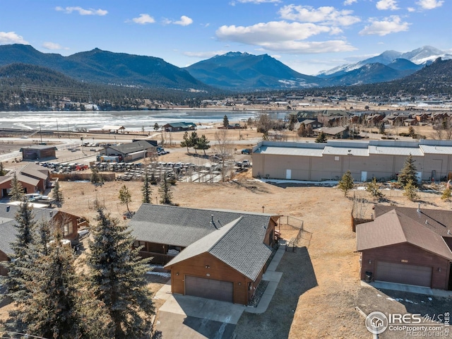 drone / aerial view featuring a mountain view