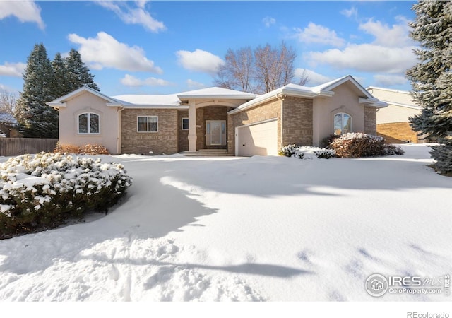 single story home featuring a garage