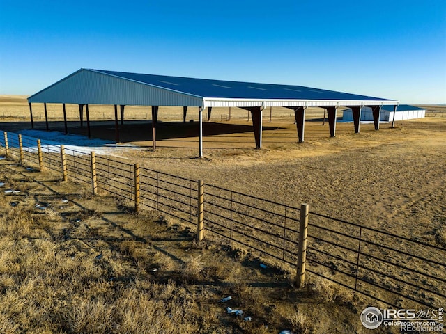 exterior space with a rural view