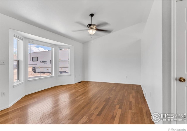 unfurnished room featuring wood-type flooring and ceiling fan