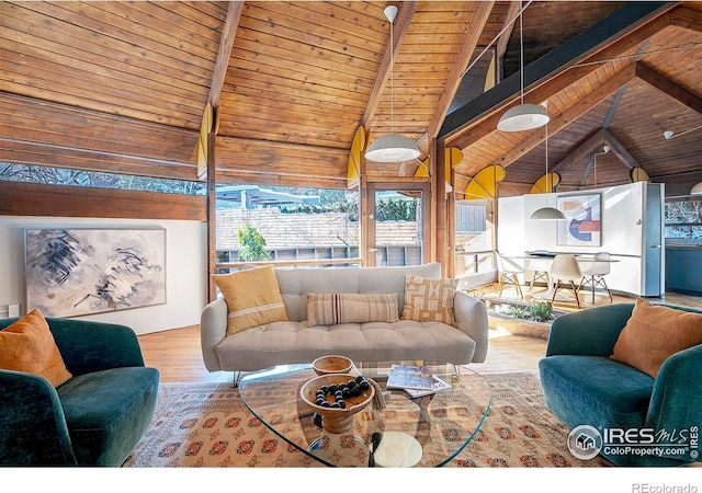 living room featuring lofted ceiling with beams, light hardwood / wood-style flooring, and wooden ceiling