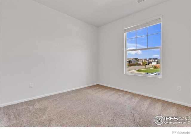 6508 Copper Dr, Frederick, CO 80516 - carpeted empty room featuring baseboards