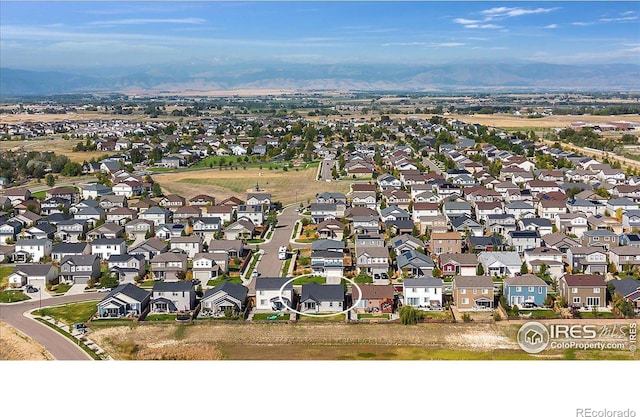 6508 Copper Dr, Frederick, CO 80516 - aerial view of residential area with mountains
