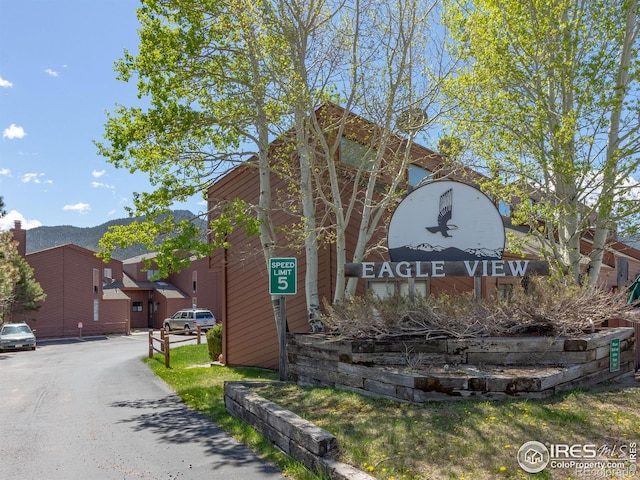 view of front of home with a mountain view