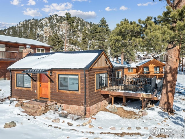 view of front of property featuring a deck