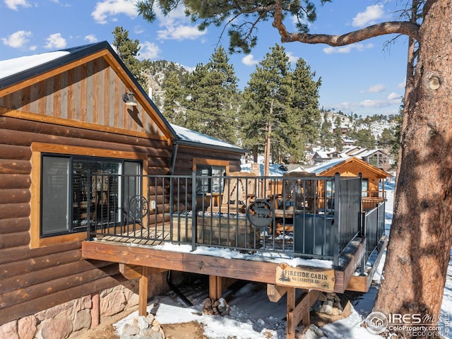 view of snow covered deck