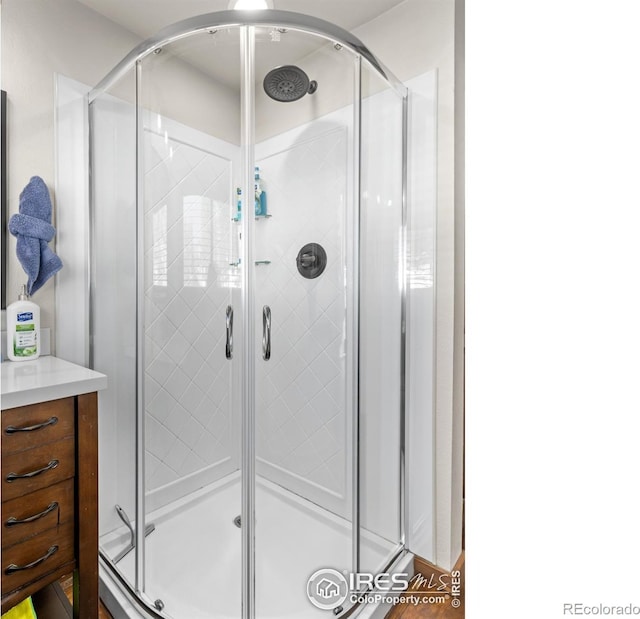 bathroom with an enclosed shower