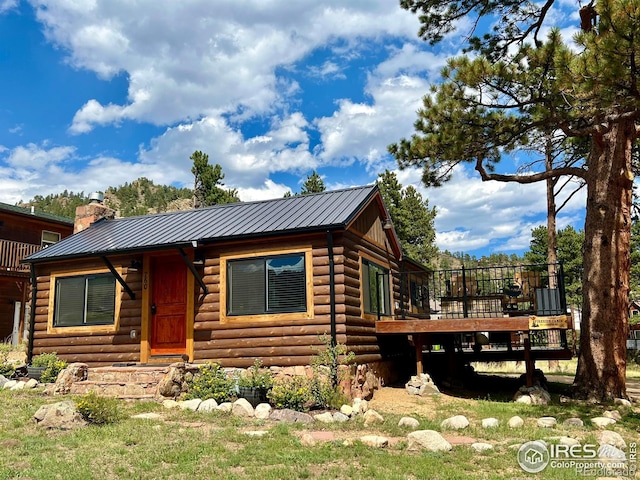 log home with a deck