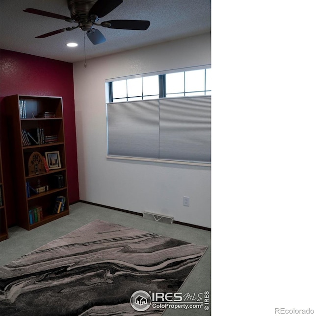 bedroom with carpet floors and ceiling fan