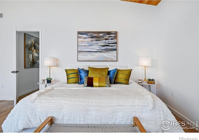 2125 Vine Ave, Boulder, CO 80304 - bedroom with wood finished floors and baseboards