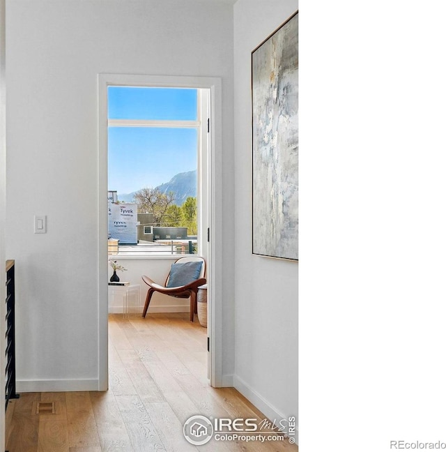 2125 Vine Ave, Boulder, CO 80304 - hall featuring light wood-type flooring, baseboards, and a mountain view