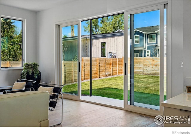 2125 Vine Ave, Boulder, CO 80304 - doorway to outside featuring light wood-style floors