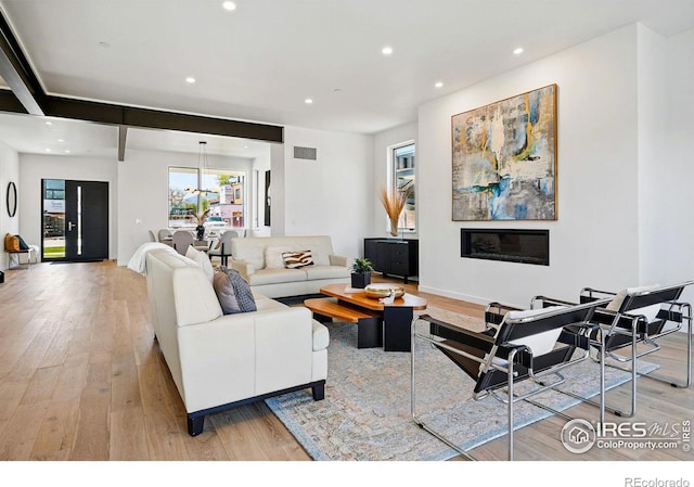 2125 Vine Ave, Boulder, CO 80304 - living area featuring light wood-style flooring, recessed lighting, and baseboards