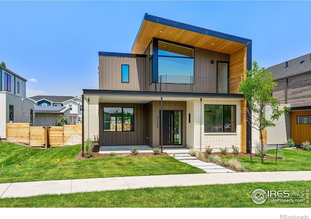 2125 Vine Ave, Boulder, CO 80304 - modern home featuring a balcony and covered porch