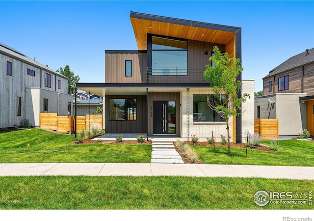 2125 Vine Ave, Boulder, CO 80304 - contemporary house featuring a balcony and a porch