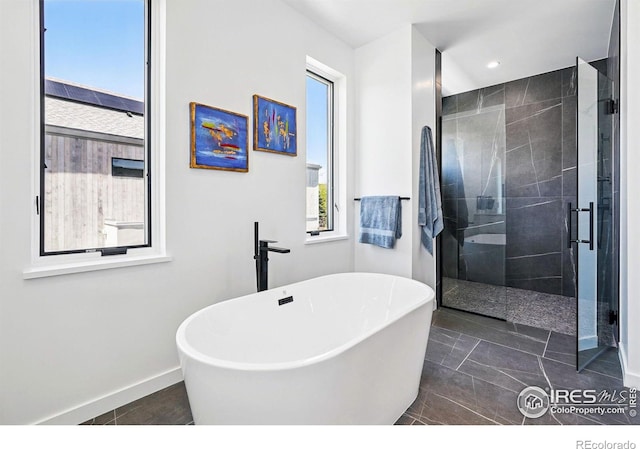 2125 Vine Ave, Boulder, CO 80304 - bathroom featuring a stall shower, a soaking tub, baseboards, recessed lighting, and tile patterned floors