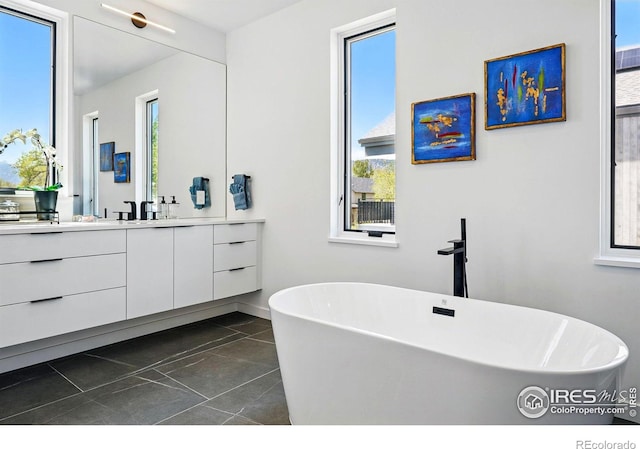 2125 Vine Ave, Boulder, CO 80304 - bathroom featuring vanity and a soaking tub