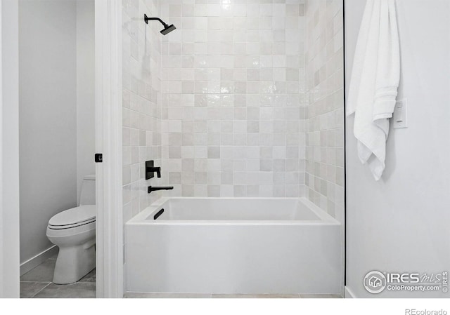 2125 Vine Ave, Boulder, CO 80304 - bathroom featuring toilet, baseboards, and shower / washtub combination