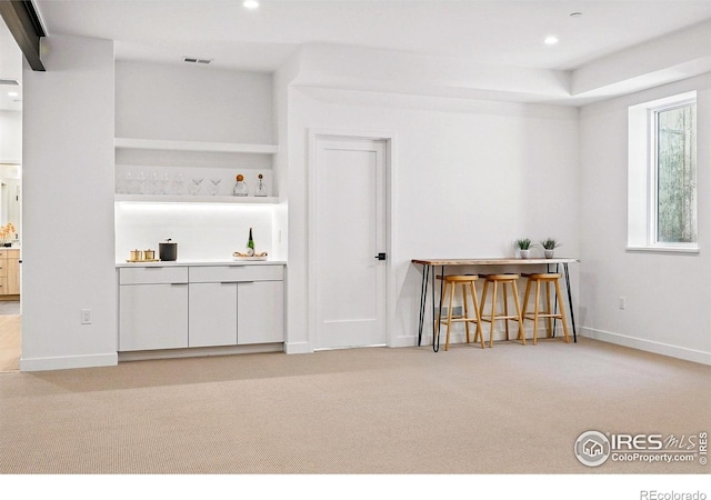 2125 Vine Ave, Boulder, CO 80304 - indoor dry bar featuring light colored carpet, recessed lighting, and baseboards