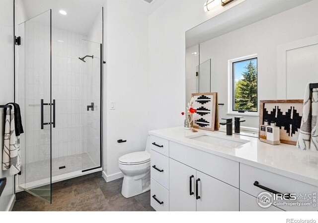 2125 Vine Ave, Boulder, CO 80304 - full bath with a stall shower, toilet, vanity, and baseboards