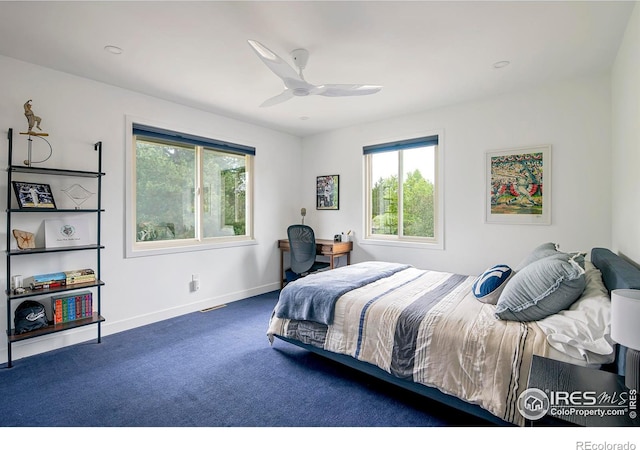 carpeted bedroom featuring ceiling fan