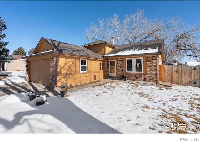 view of front of property featuring a garage