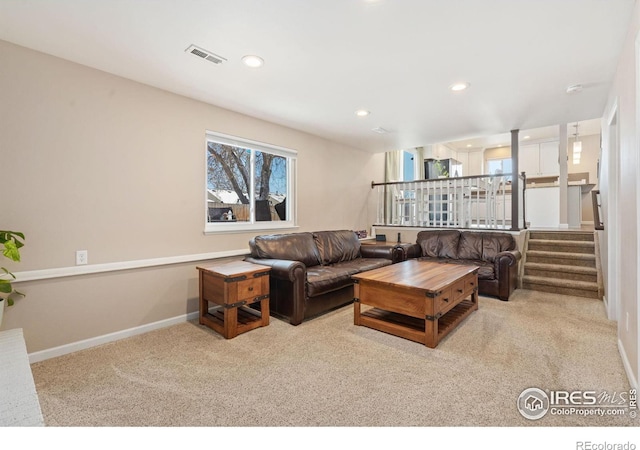 living room with light colored carpet