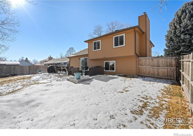 view of snow covered property