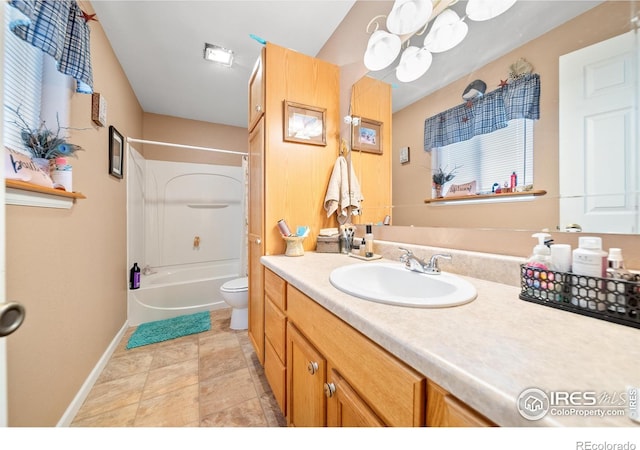 full bathroom with vanity, shower / bathtub combination, and toilet