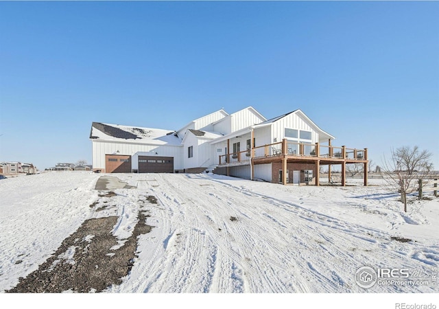 view of front of house featuring a wooden deck