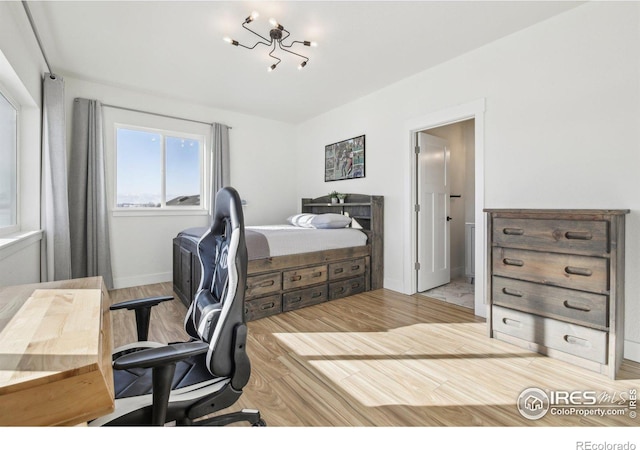 bedroom featuring light hardwood / wood-style floors