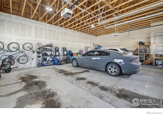 garage featuring a garage door opener