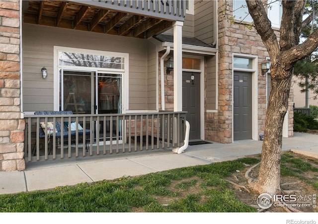 entrance to property with covered porch