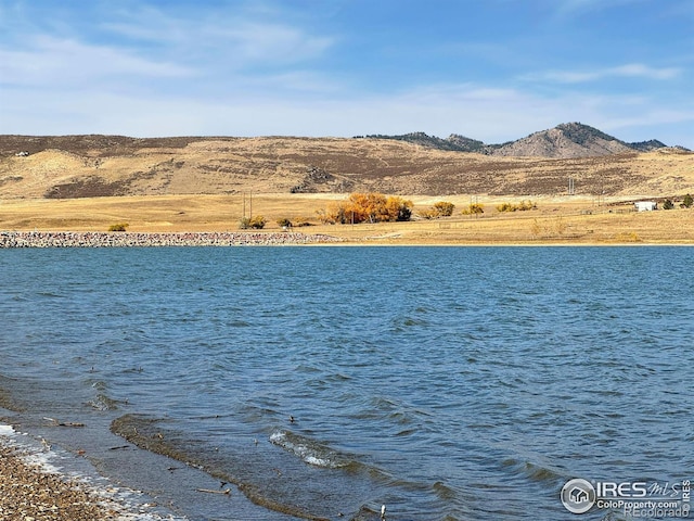 property view of water featuring a mountain view