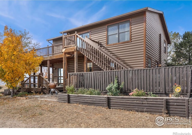 view of front of house with a deck