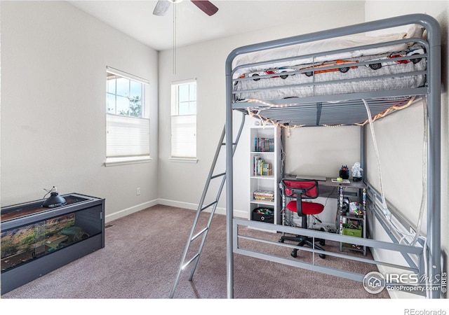 bedroom with ceiling fan and carpet