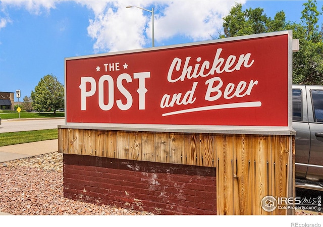 view of community sign