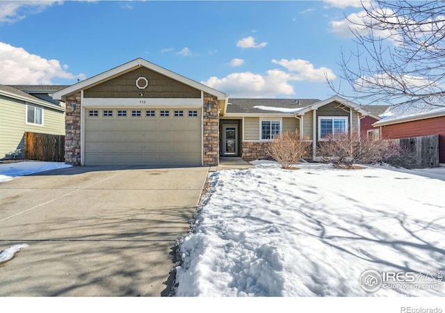 ranch-style house featuring a garage