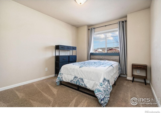 bedroom featuring carpet