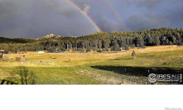 property view of mountains with a rural view