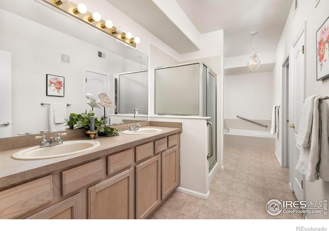 bathroom featuring vanity and plus walk in shower