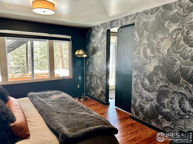 bedroom featuring hardwood / wood-style floors