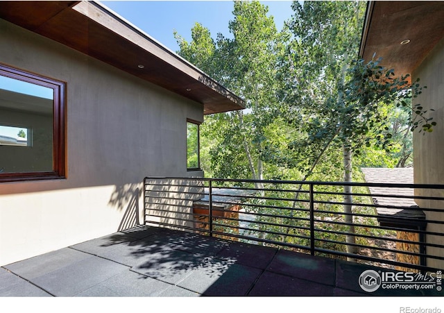 view of patio / terrace with a balcony