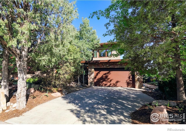 obstructed view of property featuring a garage