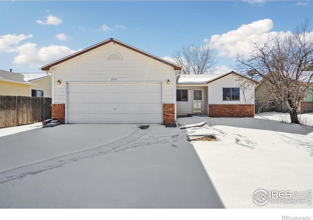 single story home with a garage