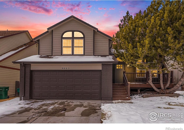 view of front of property featuring a garage