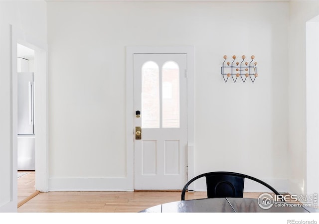 foyer entrance featuring hardwood / wood-style floors